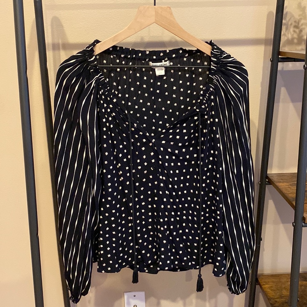 Black long sleeve white patterned blouse